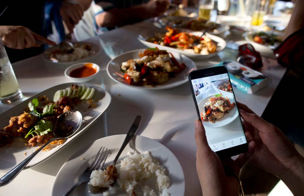 Tourists from around the world wait in three-hour queues to sample Jay Fai’s legendary crabmeat omelette. Photo: AP Tourists from around the world wait in three-hour queues to sample Jay Fai’s legendary crabmeat omelette. Photo: AP