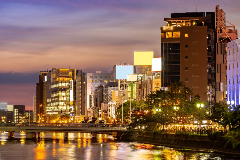 Small wonders: yatai line the banks of the Naka River, in Fukuoka old town. Photo: Shutterstock