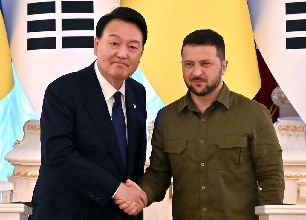South Korean President Yoon Suk-yeol shakes hands with his Ukrainian counterpart Volodymyr Zelensky following talks in Kyiv last year. Photo: AFP/Getty Images/TNS South Korean President Yoon Suk-yeol shakes hands with his Ukrainian counterpart Volodymyr Zelensky following talks in Kyiv last year. Photo: AFP/Getty Images/TNS