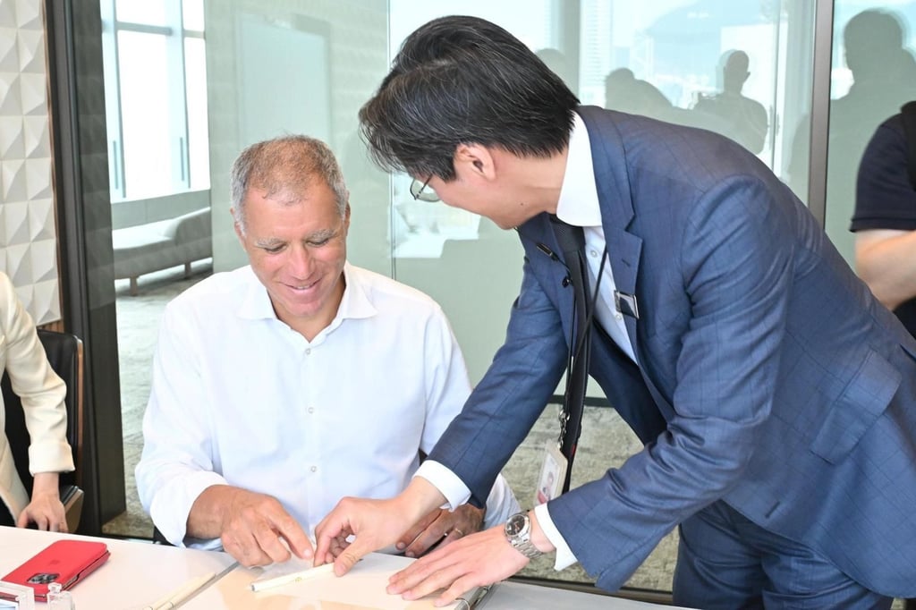A handout photograph of HSBC’s CEO Georges Elhedery (left) at the bank’s headquarters building on his first day at work in his new role on September 2, 2024. Photo: HSBC
