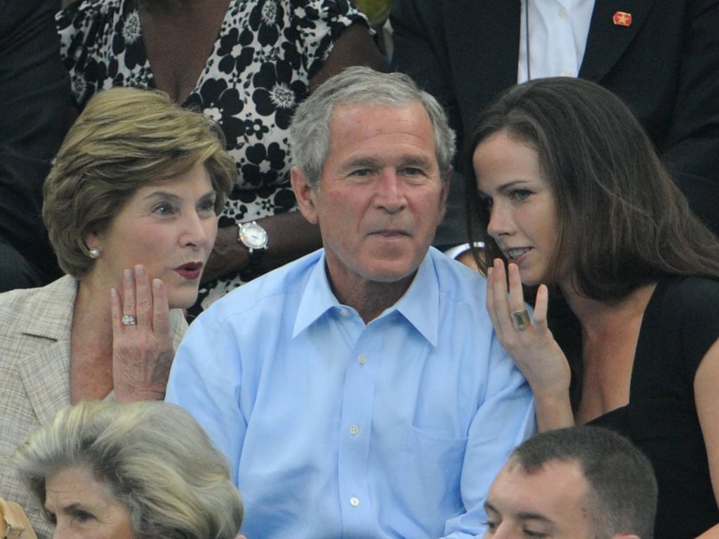 Barbara Bush (left), with her parents US President George W. Bush and Laura Bush, are seen at the National Aquatics Centre during the Beijing Olympics in August 2008. Photo: AFP