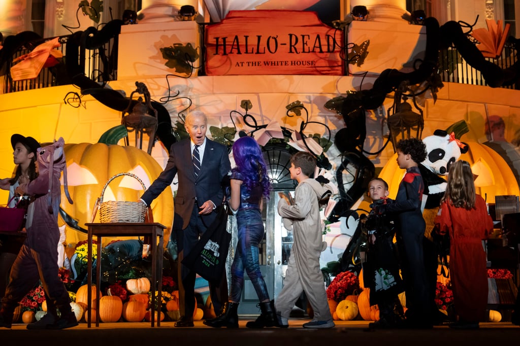 The Bidens, hosting trick-or-treaters. Photo: AP The Bidens, hosting trick-or-treaters. Photo: AP