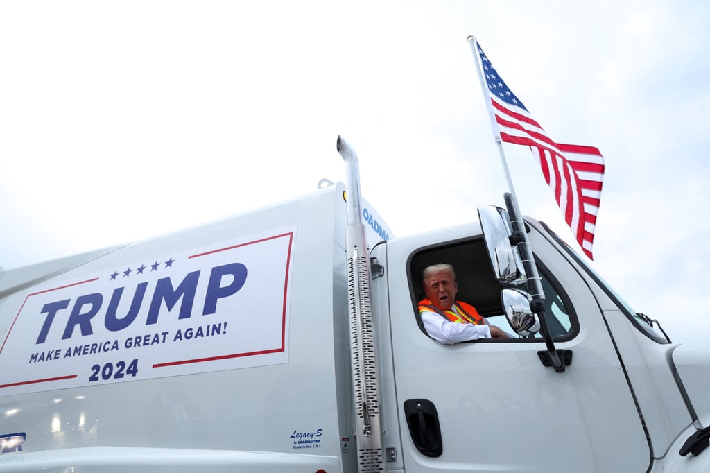 Donald Trump in a garbage truck, in Green Bay, Wisconsin. Photo: Reuters