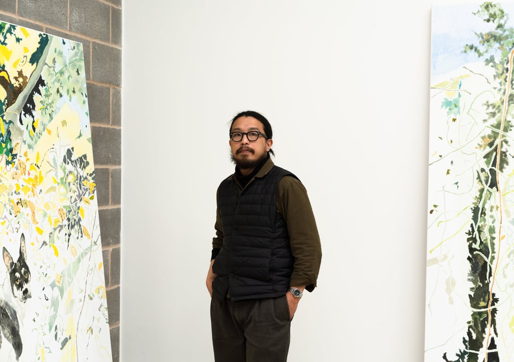 Chris Huen with two of his works. Photo: Chris Huen Chris Huen with two of his works. Photo: Chris Huen