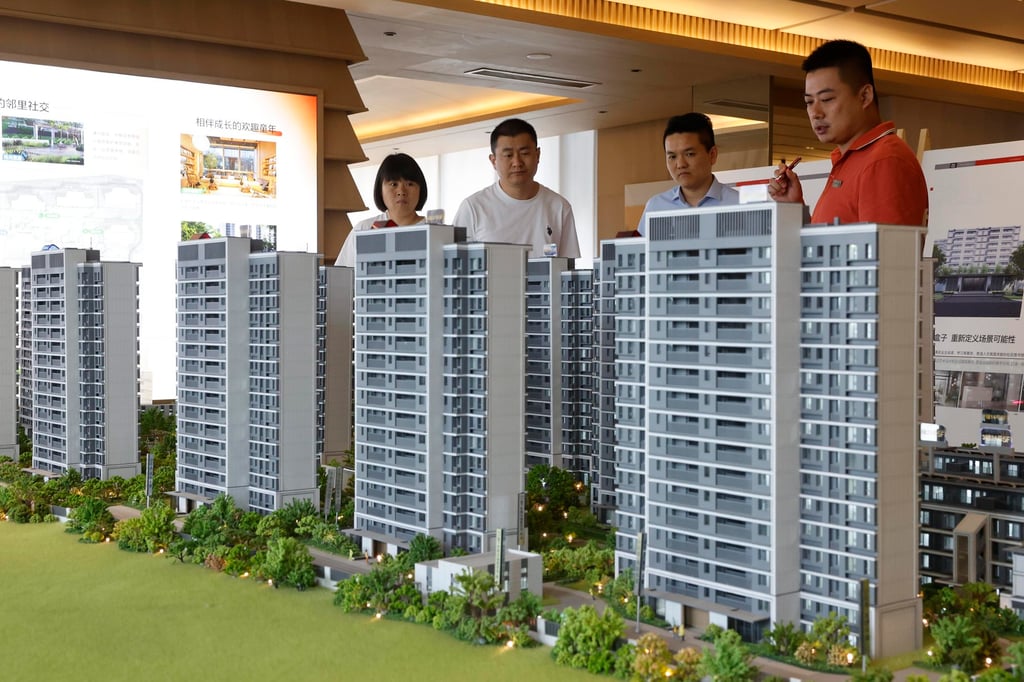 People looked at property models at a real estate sales office on June 4, 2024 in Shanghai. Photo: China News Service/VCG via Getty Images. People looked at property models at a real estate sales office on June 4, 2024 in Shanghai. Photo: China News Service/VCG via Getty Images.