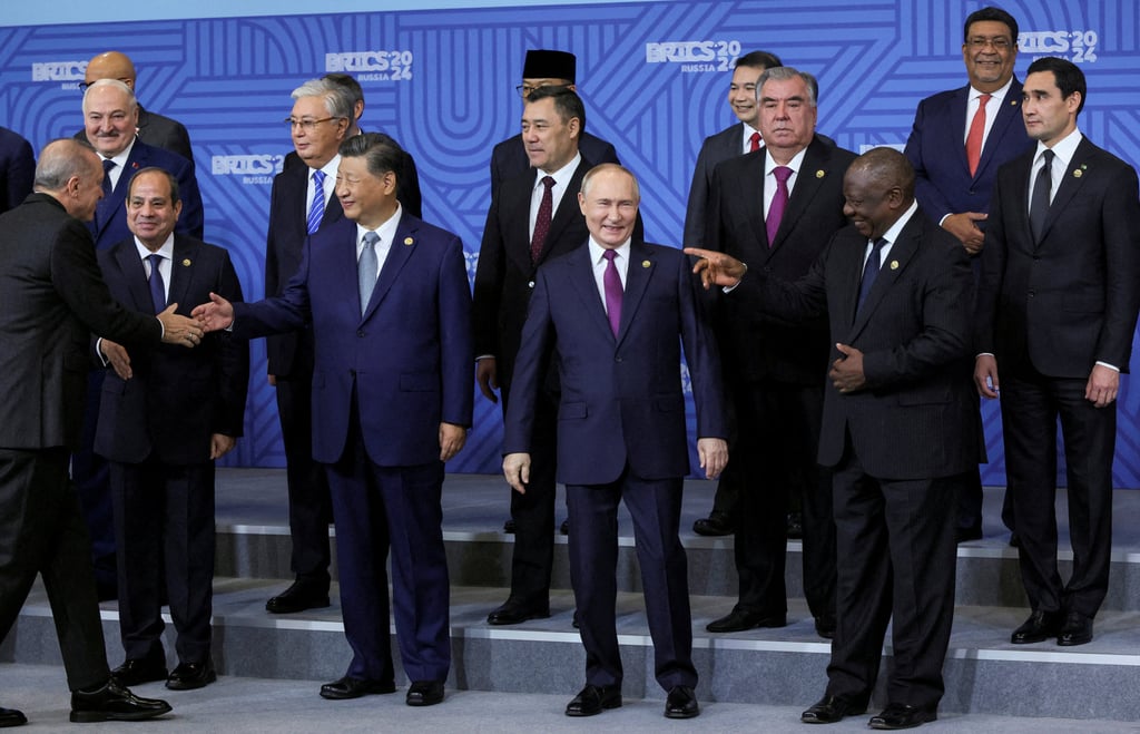 World leaders interact before the taking of a Brics family photo at the summit in Kazan, Russia, on October 24. Photo: Reuters World leaders interact before the taking of a Brics family photo at the summit in Kazan, Russia, on October 24. Photo: Reuters