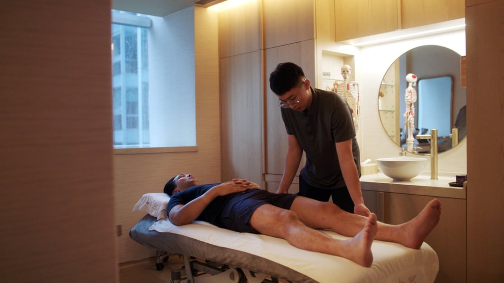 Entrepreneur Patrick Tsang, who has suffered two hip injuries in the past, tries out the pain management programme during a short session at Hong Kong’s AIA Alta Wellness Haven.