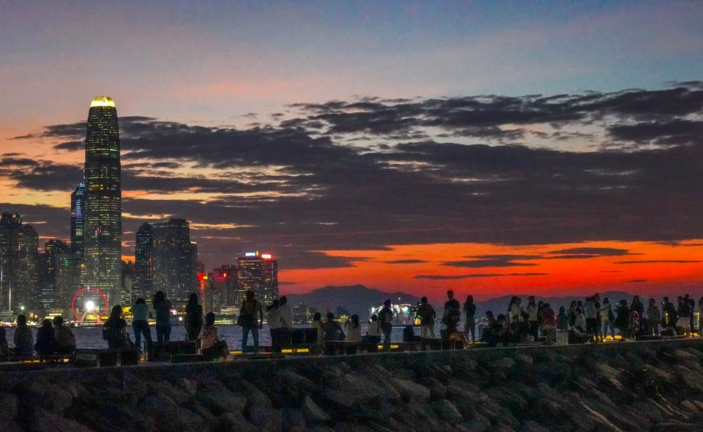 Residents enjoy the sunset at North Point amid a No 1 typhoon signal warning in late October. Photo: Robert Ng Residents enjoy the sunset at North Point amid a No 1 typhoon signal warning in late October. Photo: Robert Ng