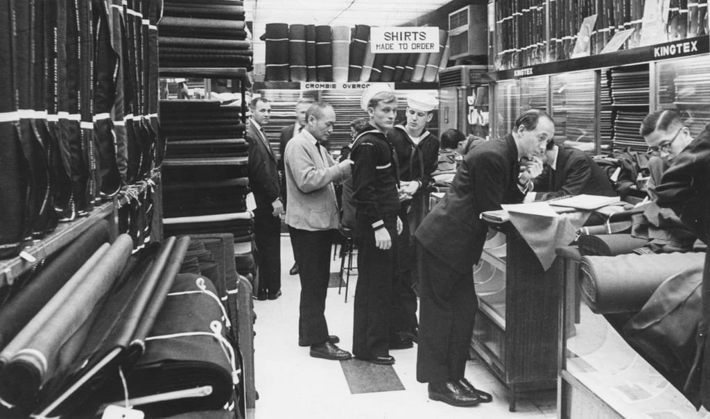 Sailors and expatriates having their suits and shirts made in a Hong Kong tailor shop in 1970. Photo: SCMP Archives Sailors and expatriates having their suits and shirts made in a Hong Kong tailor shop in 1970. Photo: SCMP Archives