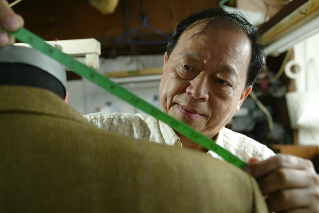 To On-ping, a traditional cheongsam tailor for four decades, in 2003. Photo: SCMP Archives To On-ping, a traditional cheongsam tailor for four decades, in 2003. Photo: SCMP Archives