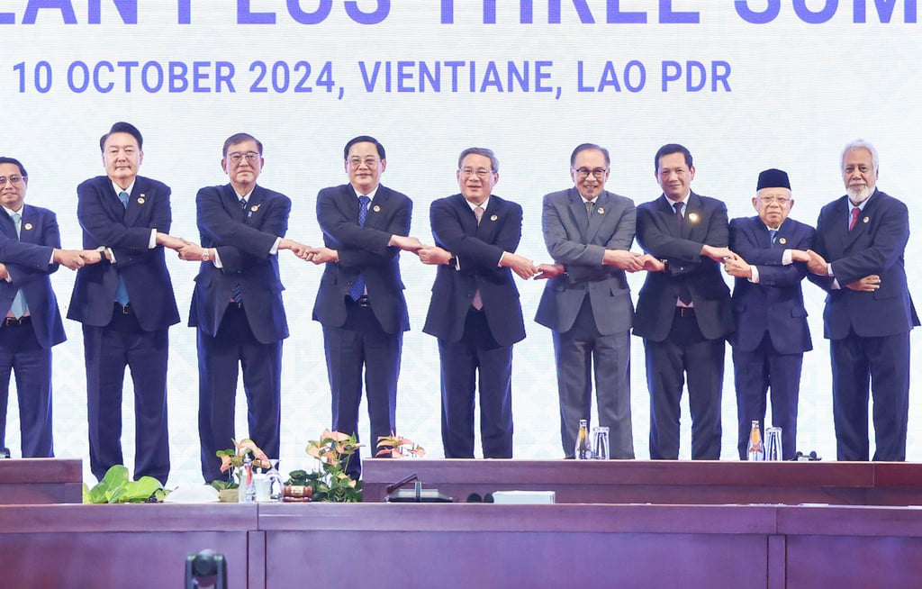 Chinese Premier Li Qiang (fifth from right) poses for a group photo with Asean leaders before a summit in Laos last month. Photo: Xinhua