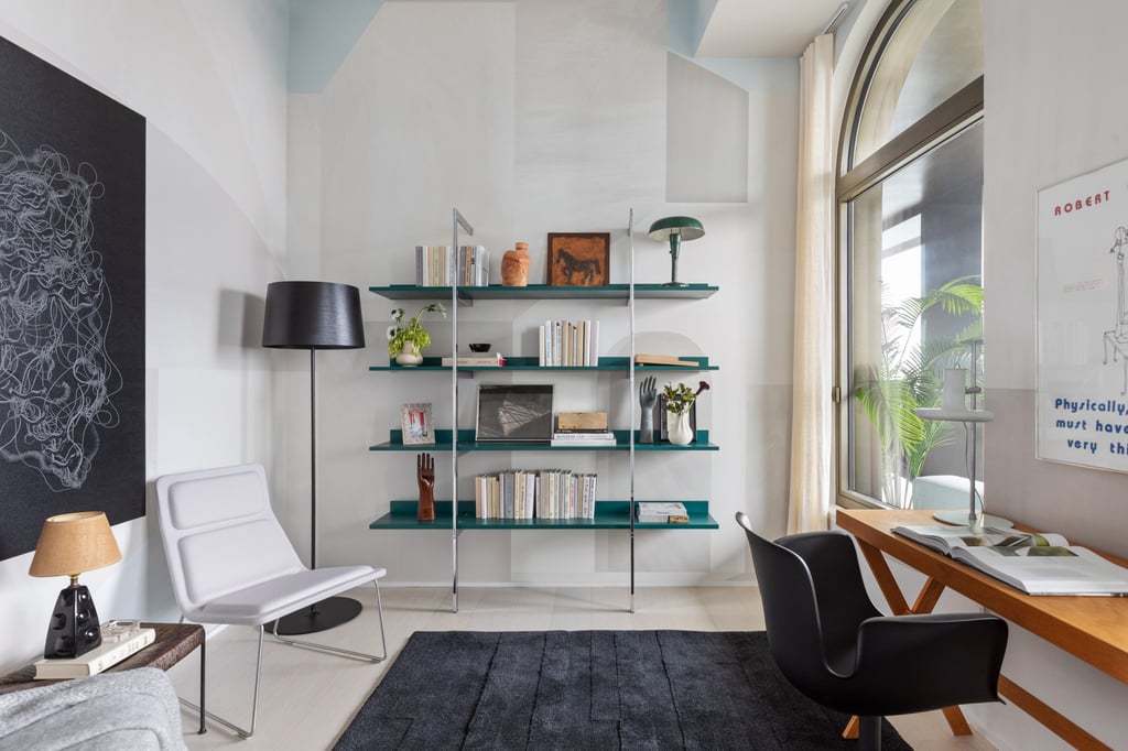 Office-style man cave featuring FrenchCalifornia pieces Office-style man cave featuring FrenchCalifornia pieces