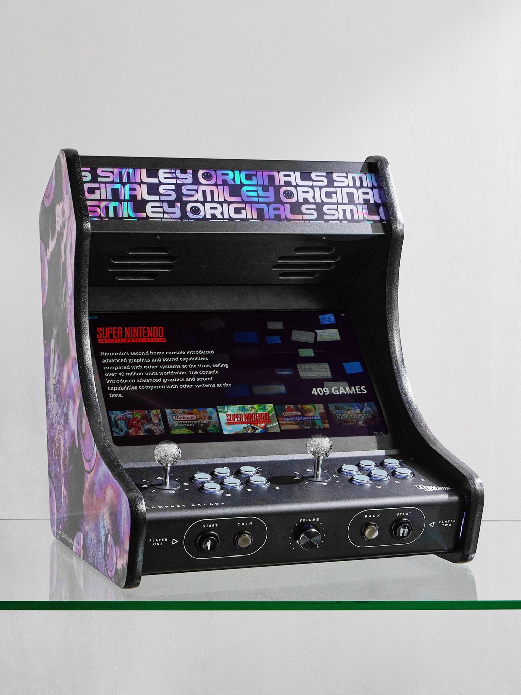 Neo Legend x The Smiley Company Hologram 90s Compact arcade game. Photo: Mr Porter Neo Legend x The Smiley Company Hologram 90s Compact arcade game. Photo: Mr Porter
