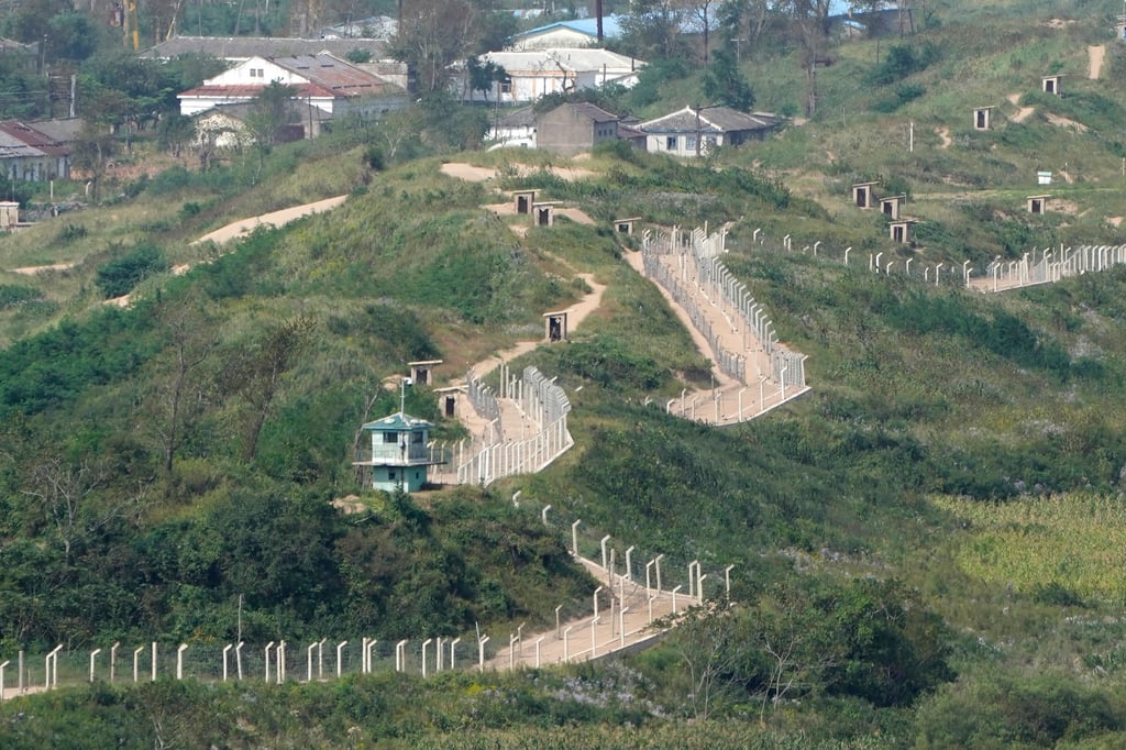 Guard posts and fences ring a hillside on the North Korea border with Russia and China, seen from a viewing platform in Fangchuan in northeastern China’s Jilin province. Photo: AP Guard posts and fences ring a hillside on the North Korea border with Russia and China, seen from a viewing platform in Fangchuan in northeastern China’s Jilin province. Photo: AP