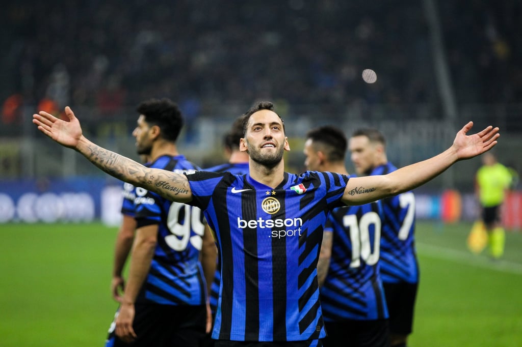 Inter Milan’s Hakan Calhanoglu celebrates scoring his side’s winner. Photo: DPA Inter Milan’s Hakan Calhanoglu celebrates scoring his side’s winner. Photo: DPA