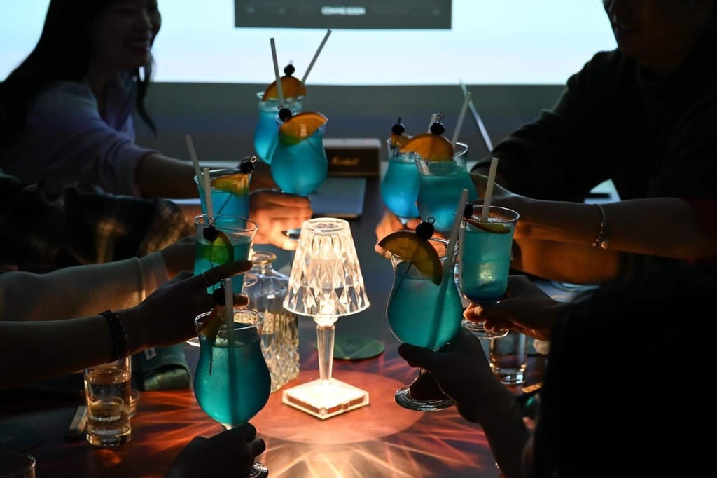 A toast goes up at Chaeg Bar, owned by Chung In-sung, in Seoul, South Korea. Photo: Instagram/chaegbar