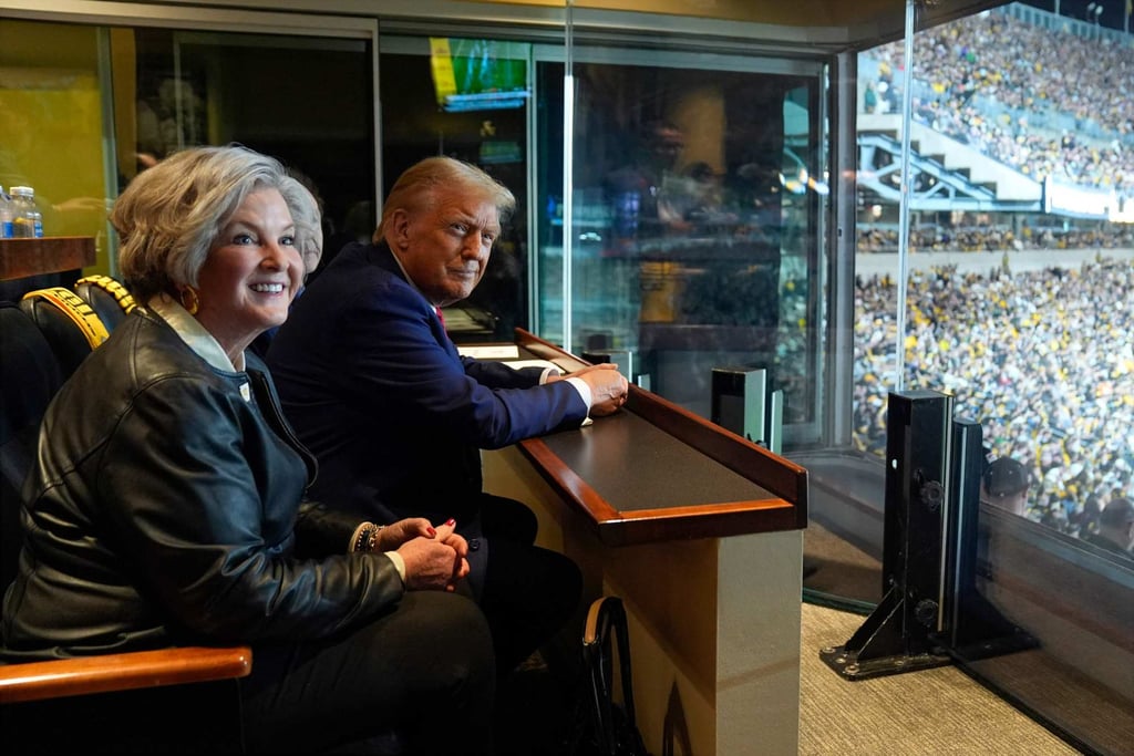 Susie Wiles and Donald Trump at a NFL game in Latrobe, Pennsylvania. Photo: AFP Susie Wiles and Donald Trump at a NFL game in Latrobe, Pennsylvania. Photo: AFP