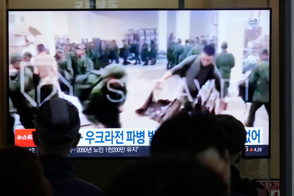 A television in Seoul shows an image of soldiers believed to be from North Korea in Russia last month. Photo: AFP A television in Seoul shows an image of soldiers believed to be from North Korea in Russia last month. Photo: AFP