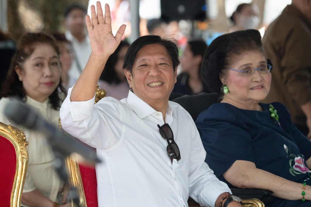 Ferdinand Marcos Jnr and his mother, former first lady Imelda Marcos, visit the tomb of his father after a mass to commemorate All Saints’ Day on November 1. Photo: AFP Ferdinand Marcos Jnr and his mother, former first lady Imelda Marcos, visit the tomb of his father after a mass to commemorate All Saints’ Day on November 1. Photo: AFP