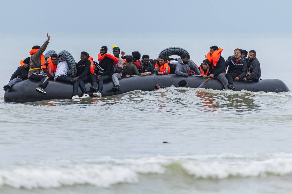 Migrants crowd a smuggler’s inflatable dinghy in an attempt to cross the English Channel, after leaving Ecault beach in Saint-Etienne-au-Mont, near Neufchatel-Hardelot, northern France on October 30. Since 2023, Croatia has been part of the Schengen Area, the European Union’s common borderless regime, and enforces strict policies regarding illegal entry into the country. Croatia has faced criticism in the European Parliament for violent pushbacks of migrants by border police. Photo: AFP Migrants crowd a smuggler’s inflatable dinghy in an attempt to cross the English Channel, after leaving Ecault beach in Saint-Etienne-au-Mont, near Neufchatel-Hardelot, northern France on October 30. Since 2023, Croatia has been part of the Schengen Area, the European Union’s common borderless regime, and enforces strict policies regarding illegal entry into the country. Croatia has faced criticism in the European Parliament for violent pushbacks of migrants by border police. Photo: AFP
