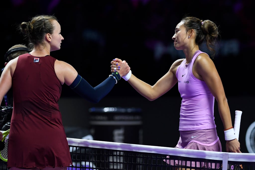 Barbora Krejcikova (left) shakes hands with winner Zheng Qinwen of China after their semi-final. Photo: AP Barbora Krejcikova (left) shakes hands with winner Zheng Qinwen of China after their semi-final. Photo: AP