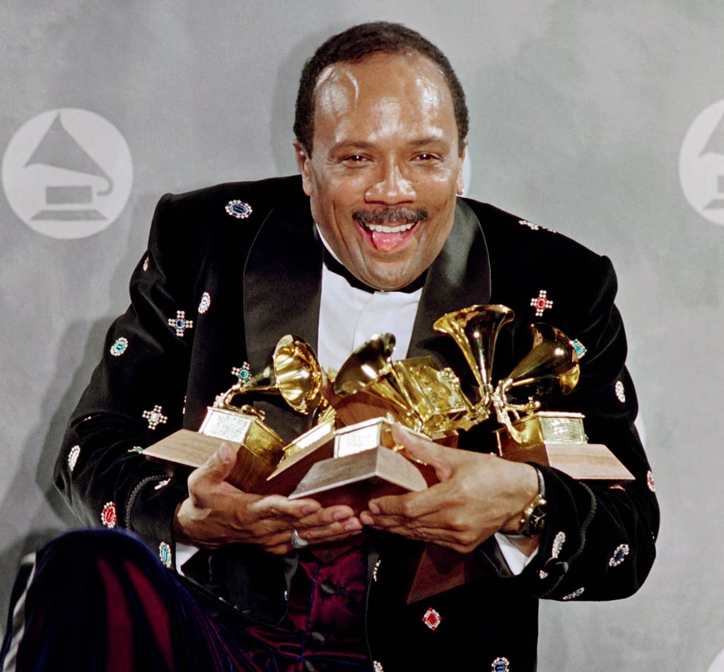 Quincy Jones holding six Grammy Awards in 1991; his lifetime total was 28. Photo: Getty Images Quincy Jones holding six Grammy Awards in 1991; his lifetime total was 28. Photo: Getty Images