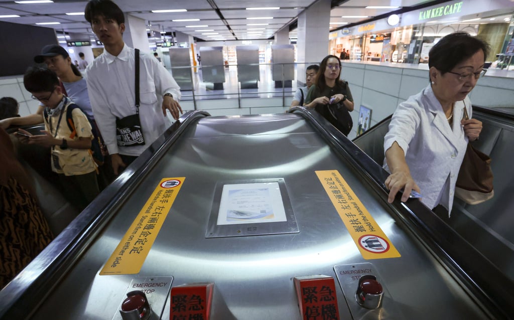 The MTR Corp says it prefers to educate travellers to stand on both sides of the escalator, rather than resort to enforcement using by-laws. Photo: Jonathan Wong