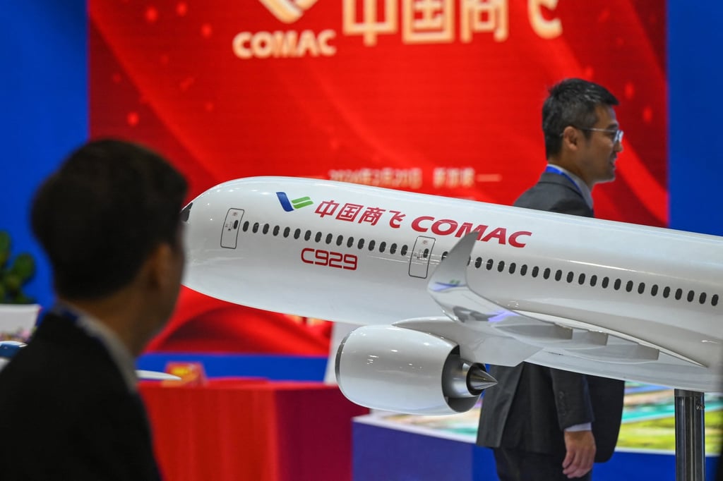 A miniature model of China’s C929 aeroplane is displayed at the Singapore Airshow on February 20. Photo: AFP