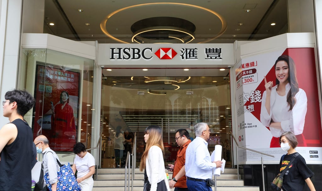 Pedestrians seen outside HSBC’s branch in Tsim Sha Tsui in October 2024. Photo: Jelly Tse Pedestrians seen outside HSBC’s branch in Tsim Sha Tsui in October 2024. Photo: Jelly Tse
