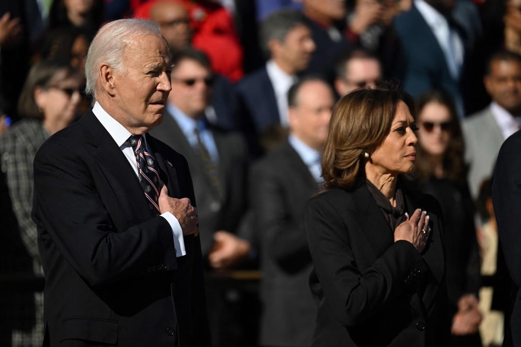 Biden and Harris stand at attention during a wreath-laying ceremony at The Tomb of the Unknown Soldier at Arlington National Cemetery in Arlington, Virginia on Monday. Photo: AFP Biden and Harris stand at attention during a wreath-laying ceremony at The Tomb of the Unknown Soldier at Arlington National Cemetery in Arlington, Virginia on Monday. Photo: AFP