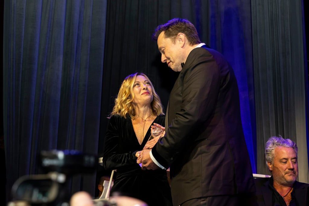 Elon Musk presents Italy’s President Giorgia Meloni with an award during the Global Citizen Awards. Photo: AP Elon Musk presents Italy’s President Giorgia Meloni with an award during the Global Citizen Awards. Photo: AP
