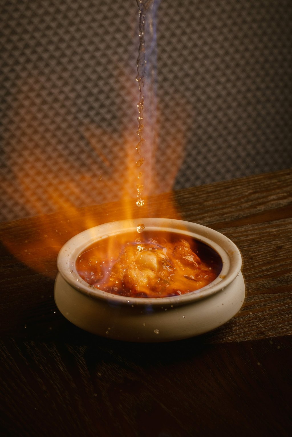 Leela’s smoked butter chicken, flambéed with Laphroaig whisky. Photo: Nicholas Wong