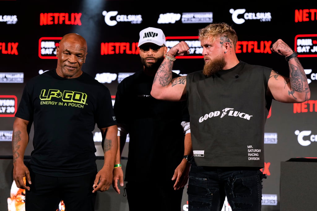 Mike Tyson and Jake Paul (right) will finally fight this weekend. Photo: AP