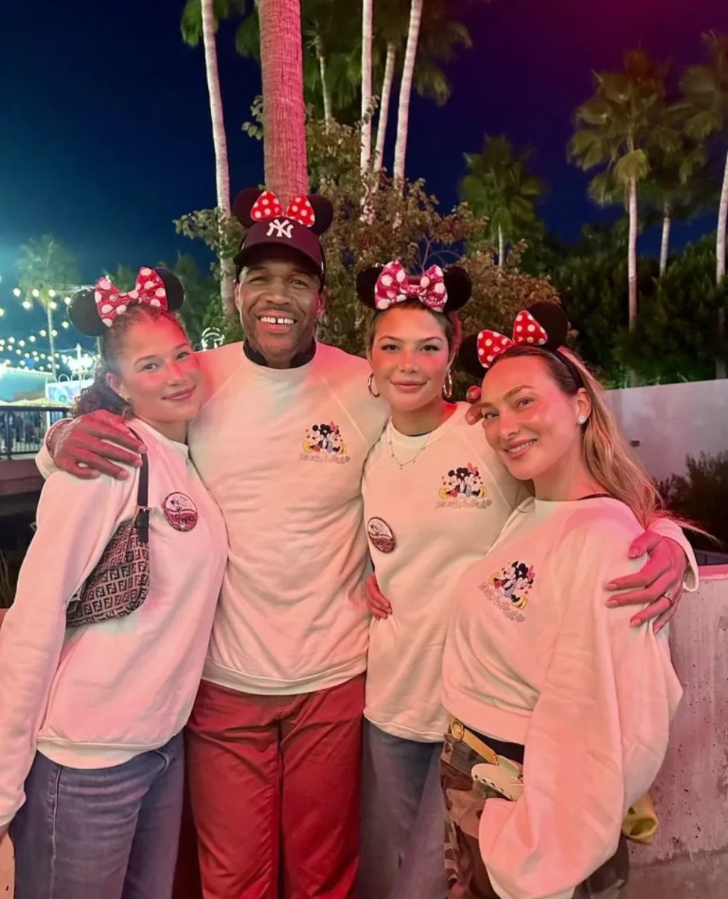 Kayla Quick (right) with Michael Strahan (centre) and his daughters. Photo: @michaelstrahan/Instagram
