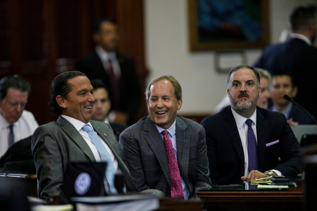 Tony Buzbee (left) with Texas Attorney General Ken Paxton (centre) and lawyer Mitch Little (right) in the Senate Chamber at the Texas Capitol, in 2023. Photo: AP Tony Buzbee (left) with Texas Attorney General Ken Paxton (centre) and lawyer Mitch Little (right) in the Senate Chamber at the Texas Capitol, in 2023. Photo: AP