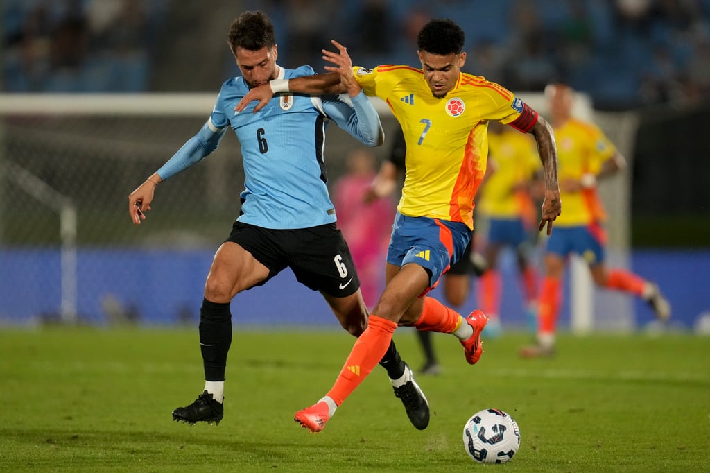 Bentancur (left) jostling with Colombia’s Luis Diaz in a World Cup 2026 qualifier in Montevideo on Friday. Photo: AP Bentancur (left) jostling with Colombia’s Luis Diaz in a World Cup 2026 qualifier in Montevideo on Friday. Photo: AP