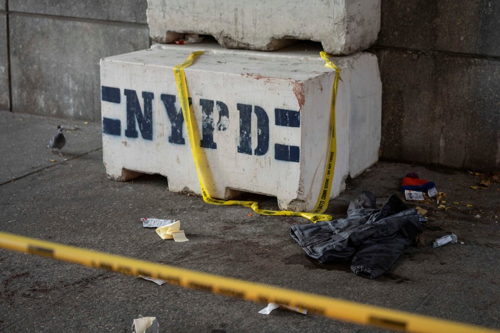 Blood stains the ground at the site of a stabbing spree near the United Nations headquarters in New York on Monday. Photo: AP Blood stains the ground at the site of a stabbing spree near the United Nations headquarters in New York on Monday. Photo: AP