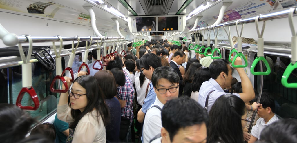 Commuters pack a subway car in Seoul, South Korea. Photo: MCT Commuters pack a subway car in Seoul, South Korea. Photo: MCT