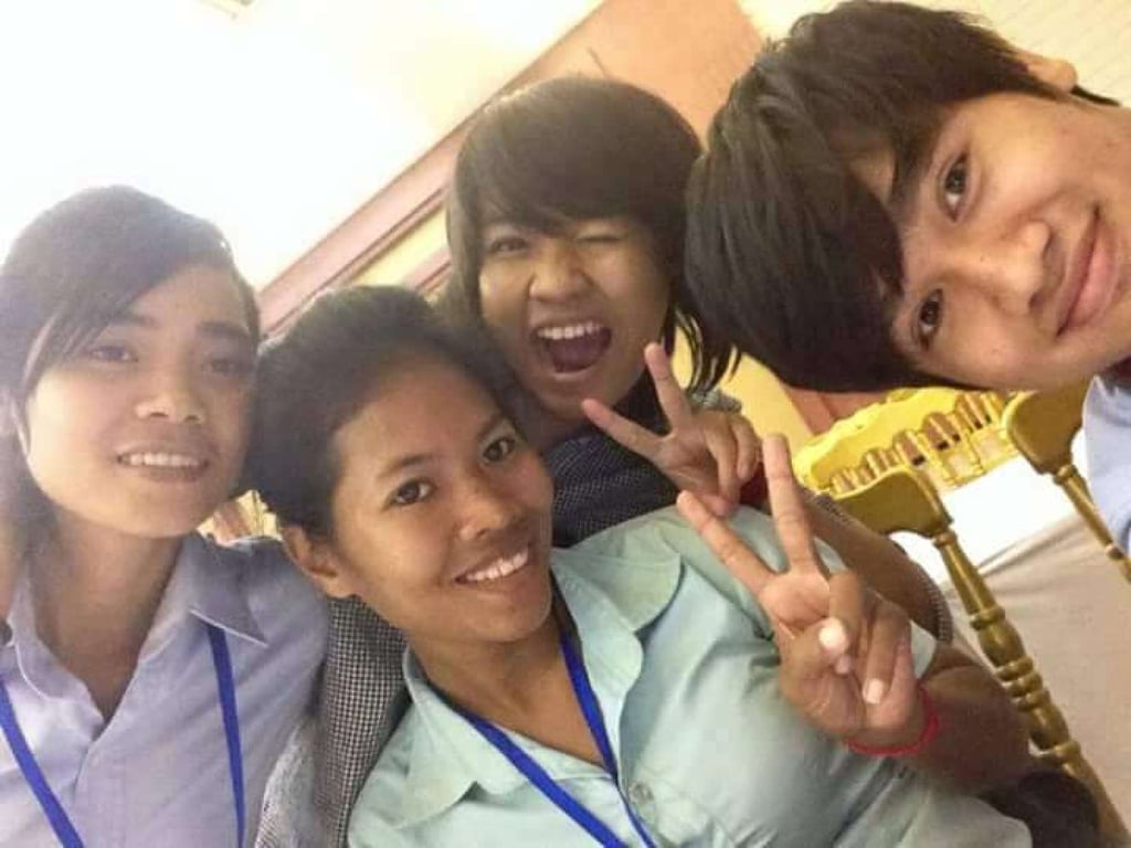 Haway Dum (second left), the youngest of nine children from a poor family in rural Cambodia, graduated from university with a degree in environmental science thanks to U-Go. She is now studying a master’s degree in Germany. Photo: U-Go Haway Dum (second left), the youngest of nine children from a poor family in rural Cambodia, graduated from university with a degree in environmental science thanks to U-Go. She is now studying a master’s degree in Germany. Photo: U-Go