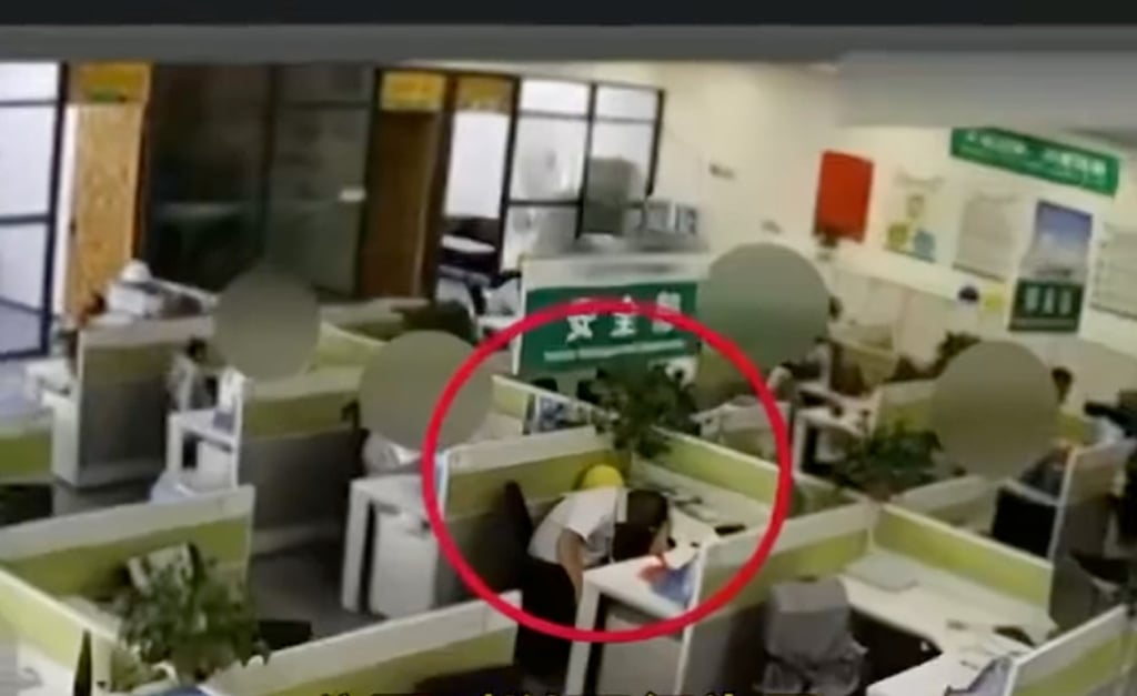 The company dismissed Zhang for sleeping on the job, failing to consider that he was fatigued from working late the night before. Photo: JSTV.com