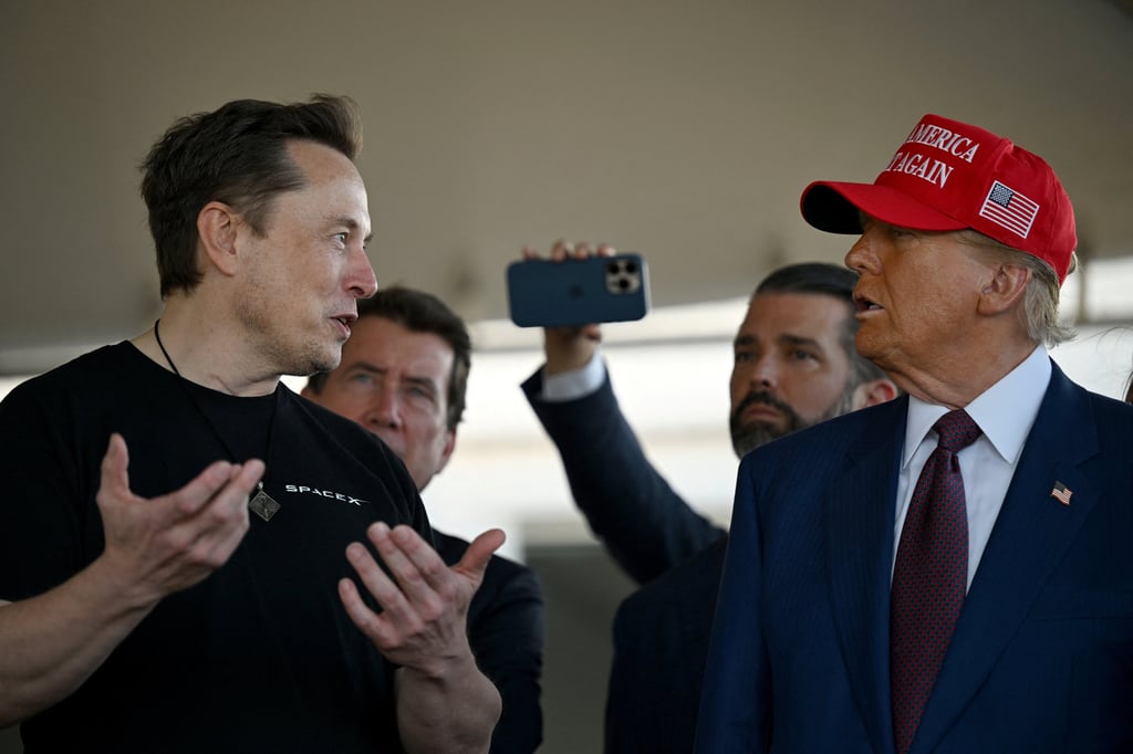Elon Musk (left) speaks with US president-elect Donald Trump at a viewing of the launch of the sixth test flight of the SpaceX Starship rocket in Brownsville, Texas, on Tuesday. Photo: Reuters