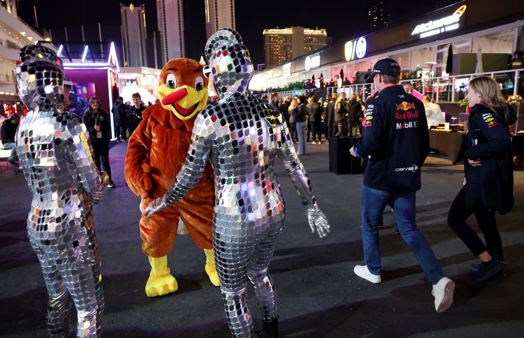 Max Verstappen (right) walking by performers on Las Vegas Strip ahead of this weekend’s race. Photo: Reuters Max Verstappen (right) walking by performers on Las Vegas Strip ahead of this weekend’s race. Photo: Reuters