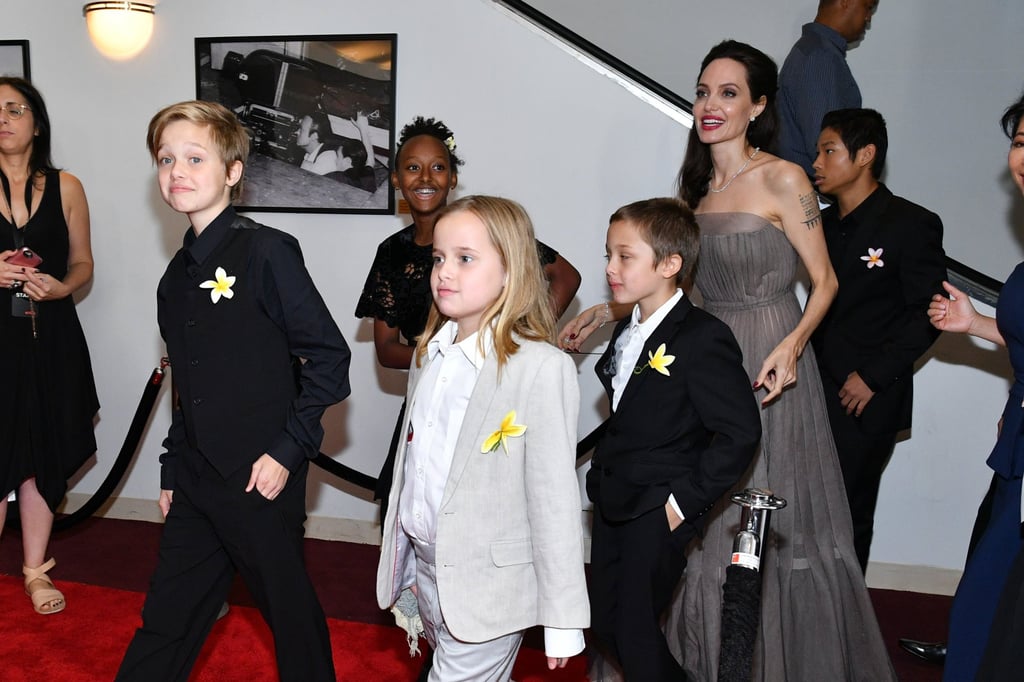 Knox Léon Jolie-Pitt (at Angelina Jolie’s feet) walking the red carpet with his mum and siblings in 2017 at a film premiere in New York City. Photo: Getty Images