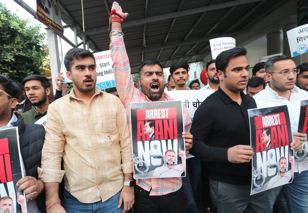 Members of National Students Union of India (NSUI), the student wing of the Indian National Congress, protest against Gautam Adani, demanding his arrest, in New Delhi, India on Thursday. Photo: EPA-EFE Members of National Students Union of India (NSUI), the student wing of the Indian National Congress, protest against Gautam Adani, demanding his arrest, in New Delhi, India on Thursday. Photo: EPA-EFE