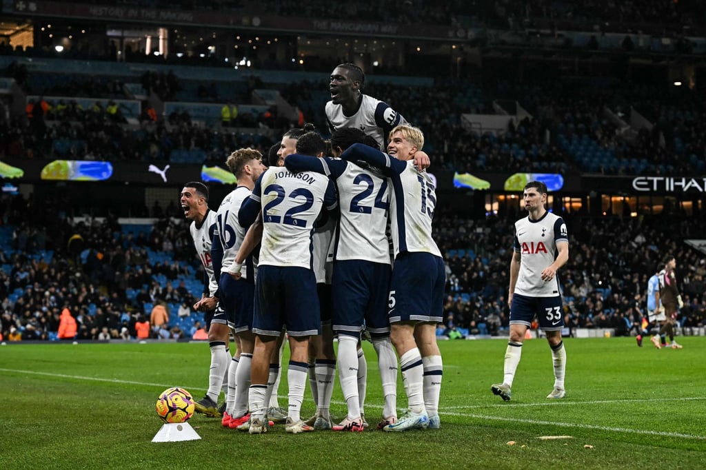 Tottenham’s Brennan Johnson celebrates with his teammates after putting his side 4-0 up at Manchester City. Photo: AFP Tottenham’s Brennan Johnson celebrates with his teammates after putting his side 4-0 up at Manchester City. Photo: AFP