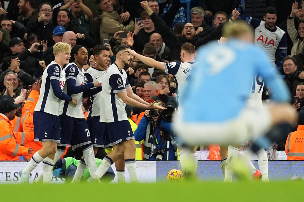 Tottenham’s joy contrasted with Manchester City’s dejection as the visitors run riot at the Etihad. Photo: DPA