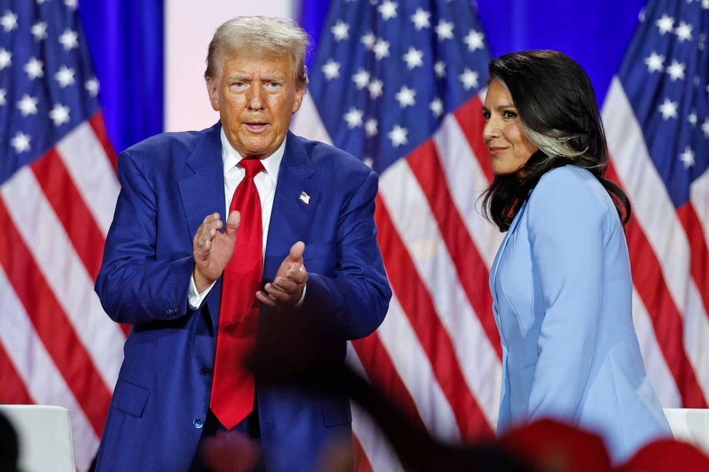 Donald Trump and Tulsi Gabbard during a town hall event in August. File photo: AP
