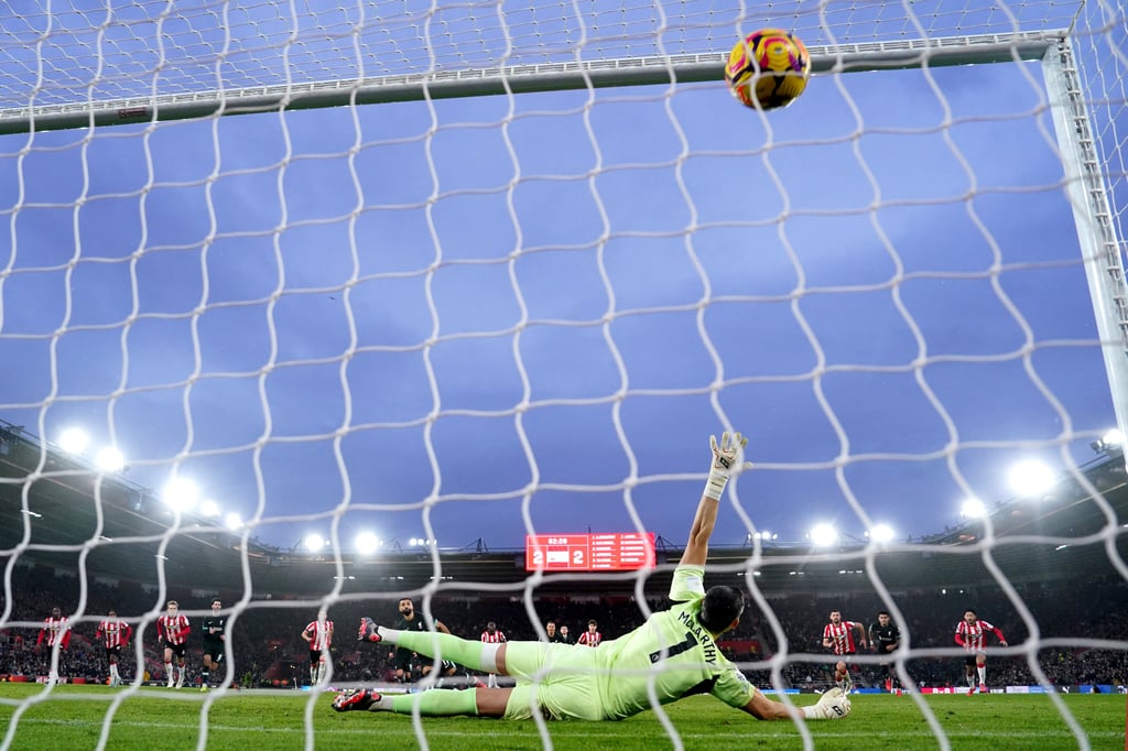 Salah scores his side’s winning goal with a penalty against Southampton at St Mary’s Stadium. Photo: dpa Salah scores his side’s winning goal with a penalty against Southampton at St Mary’s Stadium. Photo: dpa