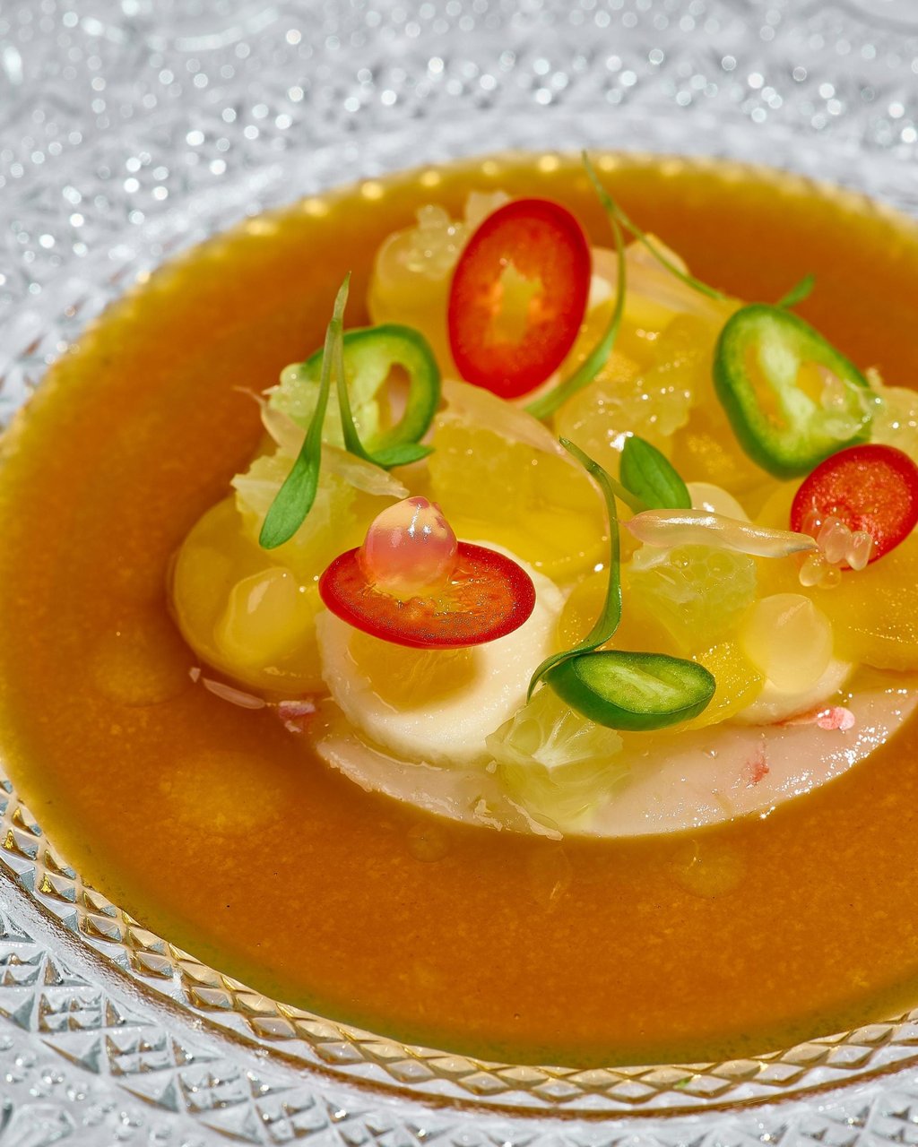 Riehn’s dish of langoustine with mango, citrus and chilli at Igniv Bangkok. Photo: Igniv Bangkok Riehn’s dish of langoustine with mango, citrus and chilli at Igniv Bangkok. Photo: Igniv Bangkok