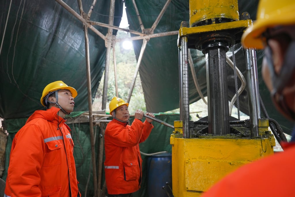 People work at the Wangu gold field in Pingjiang county, China’s Hunan province. Photo: Xinhua People work at the Wangu gold field in Pingjiang county, China’s Hunan province. Photo: Xinhua
